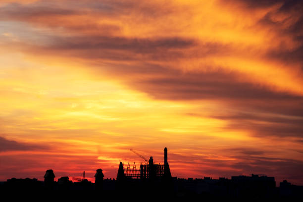 Background of a beautiful bright orange sunset with cirrus clouds