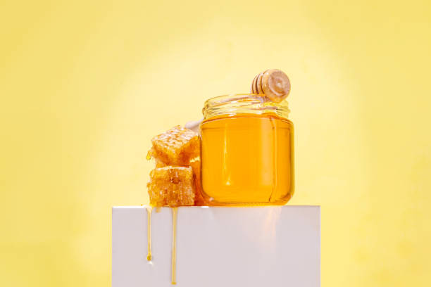 istock Honey with honey spoon and honeycomb 2149821515