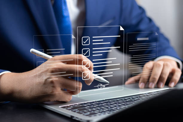 istock Electronic signature concept, E-signing, Business man using stylus pen signing contract electronic document on laptop, Document management, Sign agreement, E-documents for paperless transactions. 2149821732