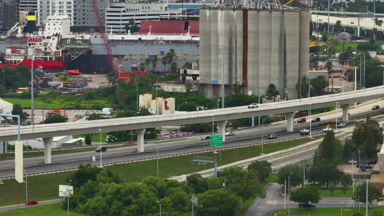 Elevated American wide freeway in Tampa, Florida with fast moving cars and trucks. USA transportation infrastructure concept