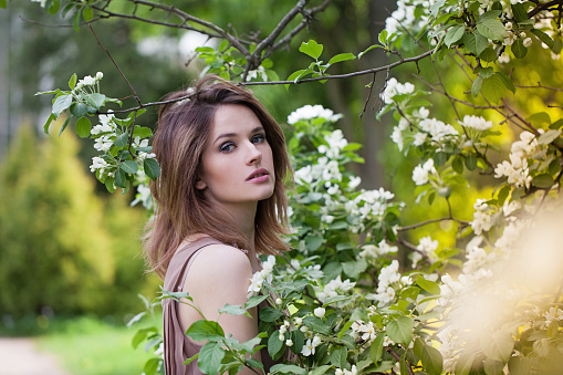 Stylish fashion model outdoors portrait. Healthy beauty woman