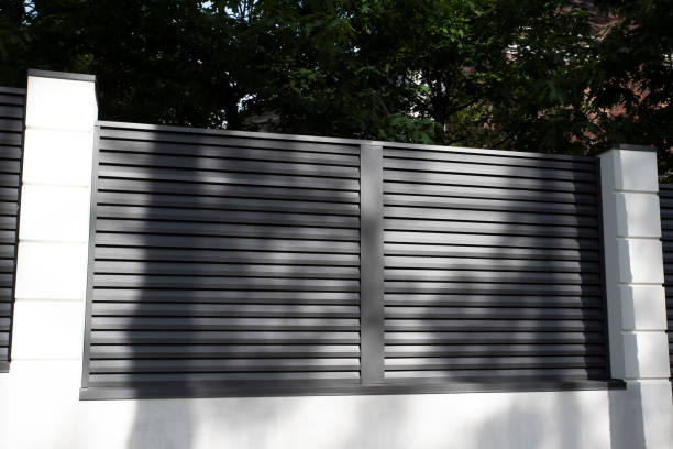 istock Modern metal fence with shutters blinds 2149824452