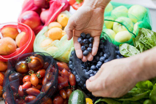 istock Fruits and vegetables in eco bags 2149828237