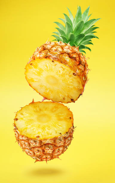 istock Ripe pineapple  and pineapple slices isolated on white background. File contains clipping path. 2149831377