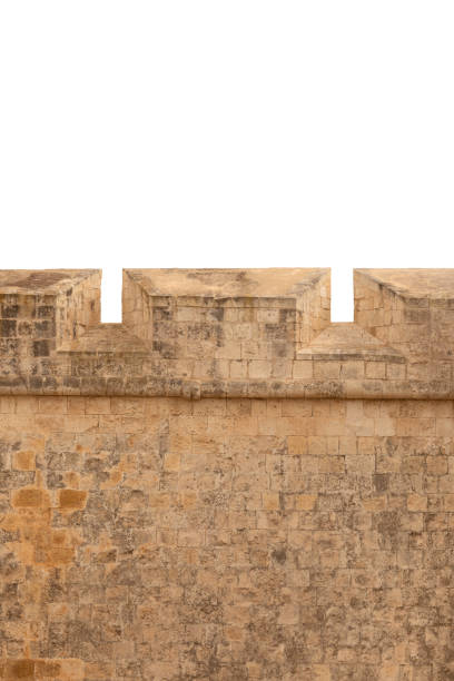 Old fortified wall with crenels isolated on white.