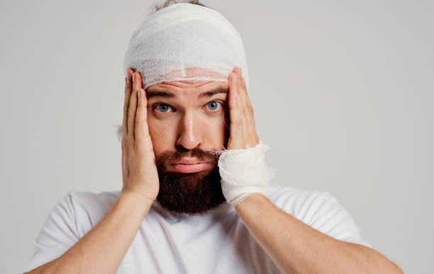 istock man with bandaged head health problems trauma discontent hospitalization 2149838037