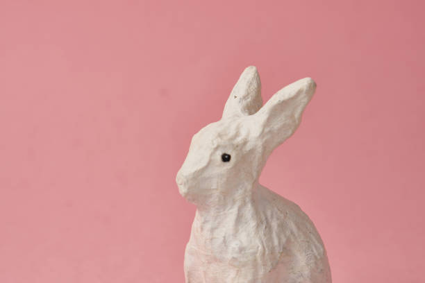 istock Easter bunny on a pink background toy animal holidays 2149844388