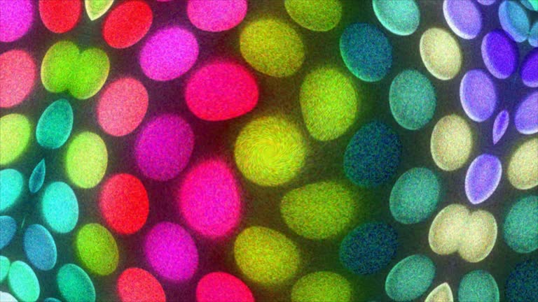 Colorful dots motion background. Rainbow comic swirl animation with grain effect.