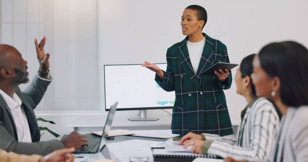 istock Business, presentation and woman coaching with pitch for ideas, growth and development at workshop. Leadership, strategy and planning, female speaker or presenter at corporate conference or seminar. 2149846927