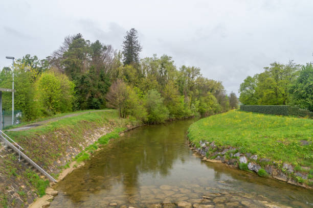 istock Leiblach river at cloudy day. View on border river between Germany and Austria. 2149847825