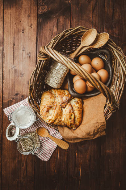 Oatmeal and potato bread on kitchen table in brown tone