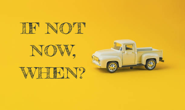 istock a yellow background with the words If not now, when 2149850918