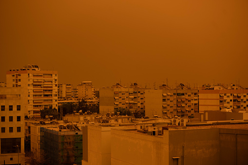 The city of Athens covered with dust from the Saharan desert on Tuesday, April 23, 2024. Swathes of Greece have been shrouded in haze as persistent southerly winds have carried waves of dust from the African continent across the Mediterranean.