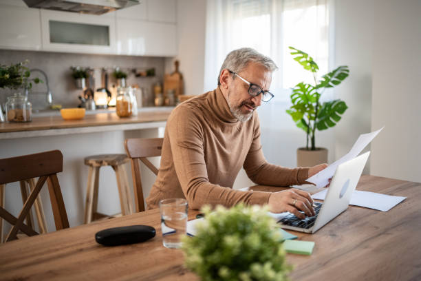 istock Confident mature freelancer working online from home 2149854056