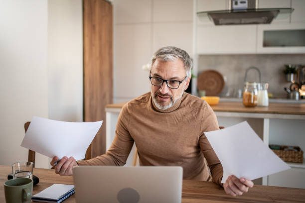 istock Confident mature freelancer working online from home 2149854060