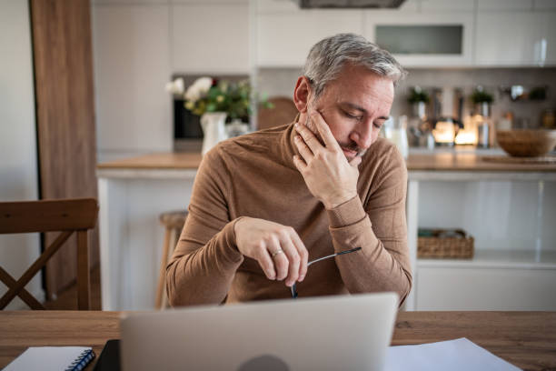 istock Confident mature freelancer working online from home 2149854250