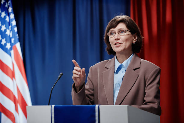 istock Female minister speaking to audience 2149856980