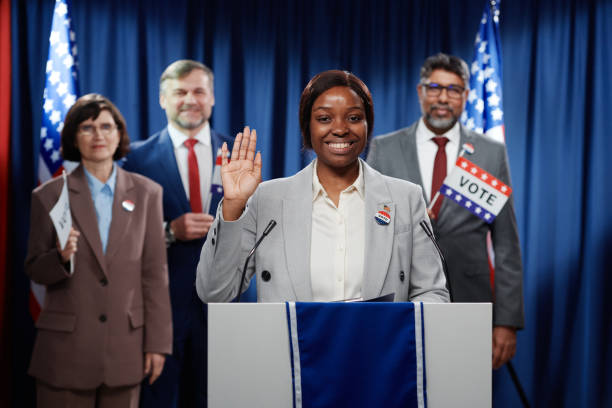 istock Cheerful female politician taking oath 2149857047