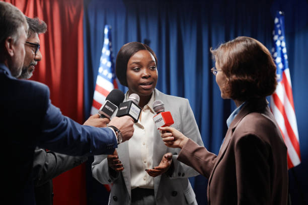 istock Answering questions at press conference 2149857060