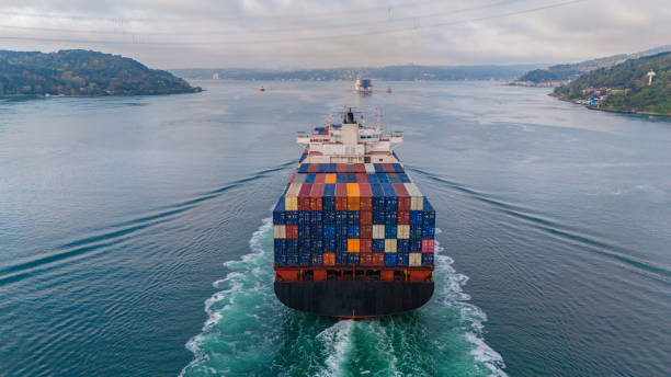 istock Aerial rear view of container cargo logistic ship in transit in the ocean. 2149858497