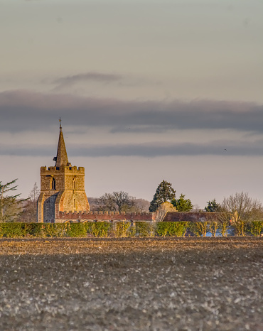 located in Essex looking across fields at the church