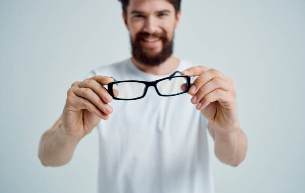 istock bearded man wearing glasses poor eyesight health problems treatment Studio 2149858984