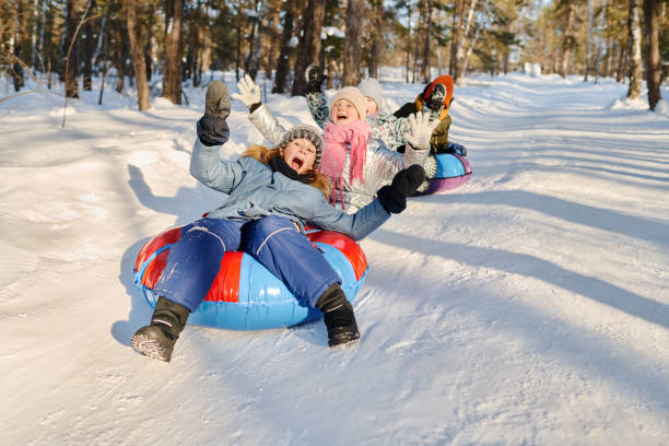 istock Moving down hill on tubes and slides 2149859036