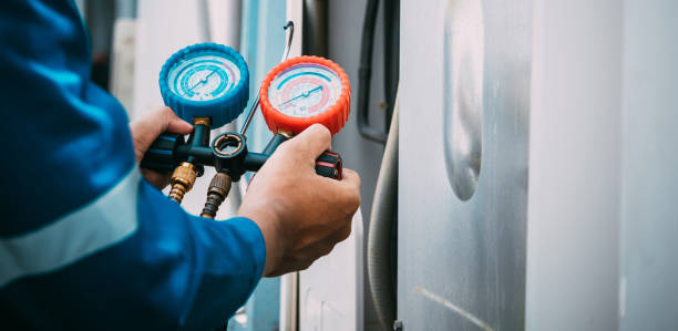istock Technician is checking air conditioner refrigerant leak. 2149859243