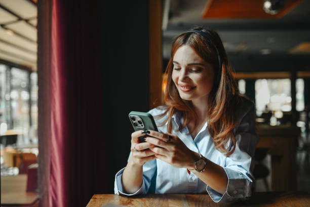 istock Smartphone Video Call For Female With Headphones 2149859283