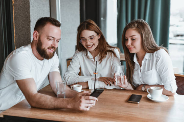istock Females Learning About New Smartphone Features From Male 2149859602