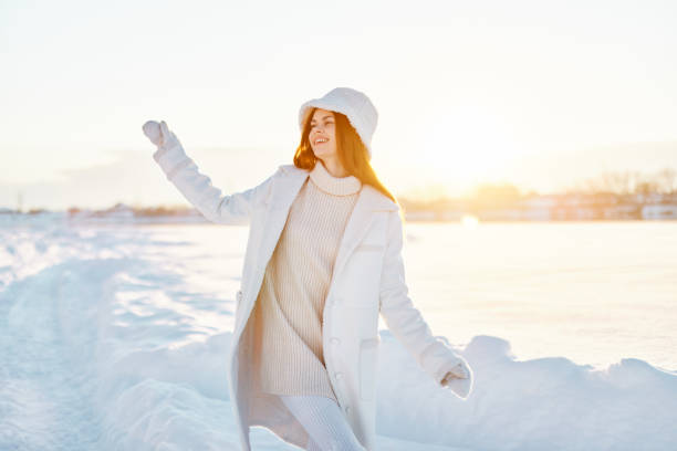 woman smile Winter mood walk white coat Lifestyle. High quality photo