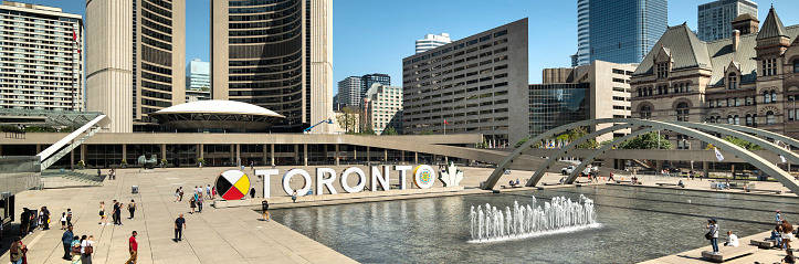 Toronto, Canada - August 29, 2023: Nathan Phillips Square and government City Hall in downtown Toronto Ontario panoramic