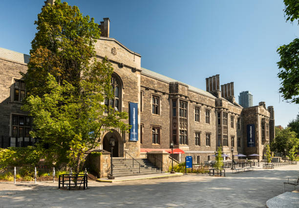 Toronto, Canada -April 26, 2024: The campus of the University of Toronto is full of flowers and students walking everywhere in spring