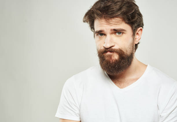 istock Man in t-shirt cropped view model sad face emotions 2149863162