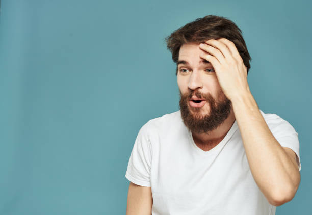 istock Emotional man on a blue background gestures with his hands surprise model delight 2149863366