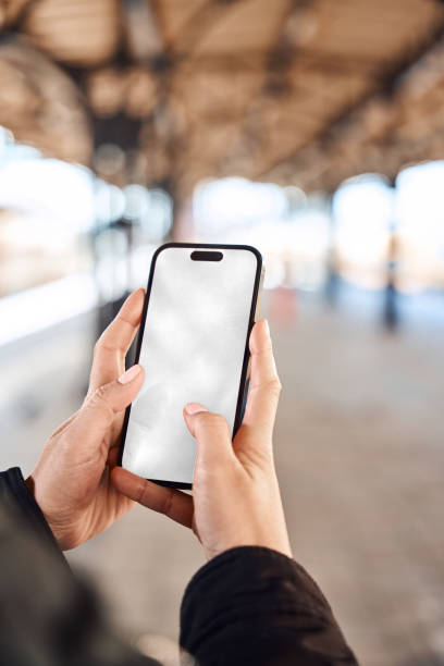 istock Smart Phone mock up at the train station 2149865893