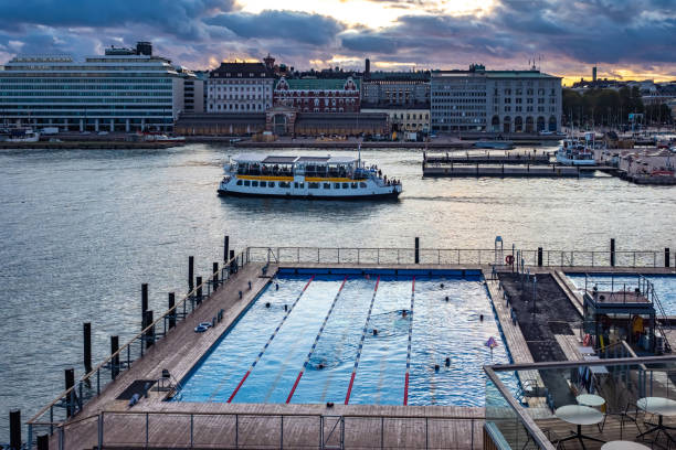 Helsinki. Finland. Pool near the sea. Helsinki city harbor. Rest area on the pier. Helsinki Harbor View Pool. Entertainment in Finland. Public spaces. Traveling around the cities of Finland. helsinki. finlandia. piscina cerca del mar. puerto de la ciudad de helsinki. Área de descanso en el muelle. piscina con vistas al puerto de helsinki. entretenimiento en finlandia. espacios públicos. viajando por las ciudades de finlandia.