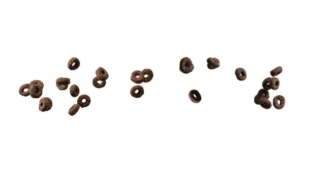 istock Chocolate rings cereal spill out into a bowl. Breakfast. 2149866483