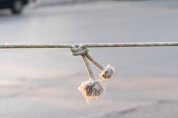 a colored rope tied with knots