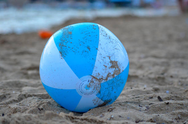 Close-Up Of Multi Colored Ball Against White Background