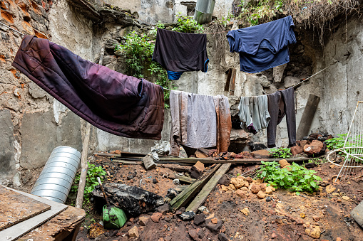 Laundry hanging in old abandoned garden