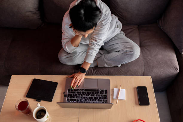 istock Young woman works from home 2149870288