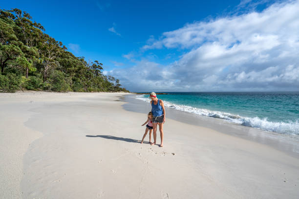 istock Mother and Daughter Exploring a Beautiful White Sand Beach in Eastern Australia 2149872617