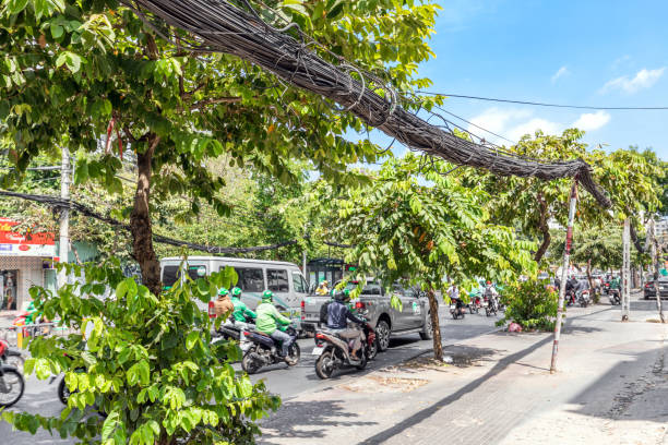 Ho Chi Minh, Vietnam - March 12, 2024: A chaos of electrical cables and wires in the center of Ho Chi Minh City