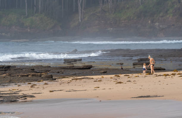 istock Mother and Daughter exploring a Beautiful White Sand Beach in Eastern Australia 2149873585