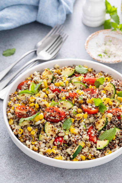 istock Quinoa salad with vegetables and herbs in a serving bowl 2149878140