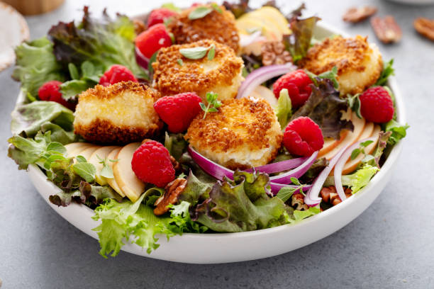 istock Fried goat cheese salad with raspberries and red onion, camera slides 2149878667