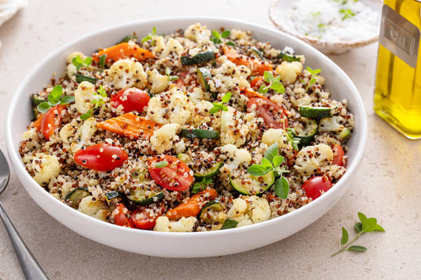 istock Quinoa salad with roasted vegetables and fresh herbs and tomatoes 2149878697