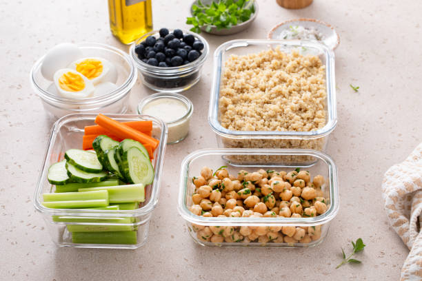 istock Meal prep containers with healthy food prepped, cooked quinoa, chickpeas and eggs 2149878714