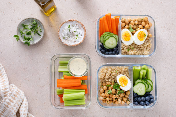 istock Meal prep containers with healthy food prepped, cooked quinoa, chickpeas and eggs 2149878730